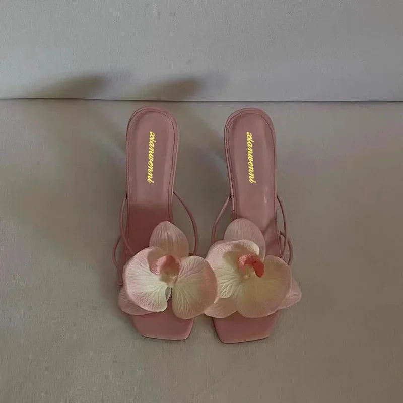 Chic pink sandals with a stylish design, perfect for summer outings and adding a pop of color to your wardrobe
